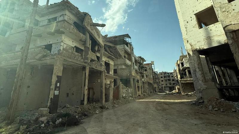Menschen gehen zurück nach Syrien
